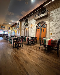 Tables and Italian-inspired wall details in the dining room